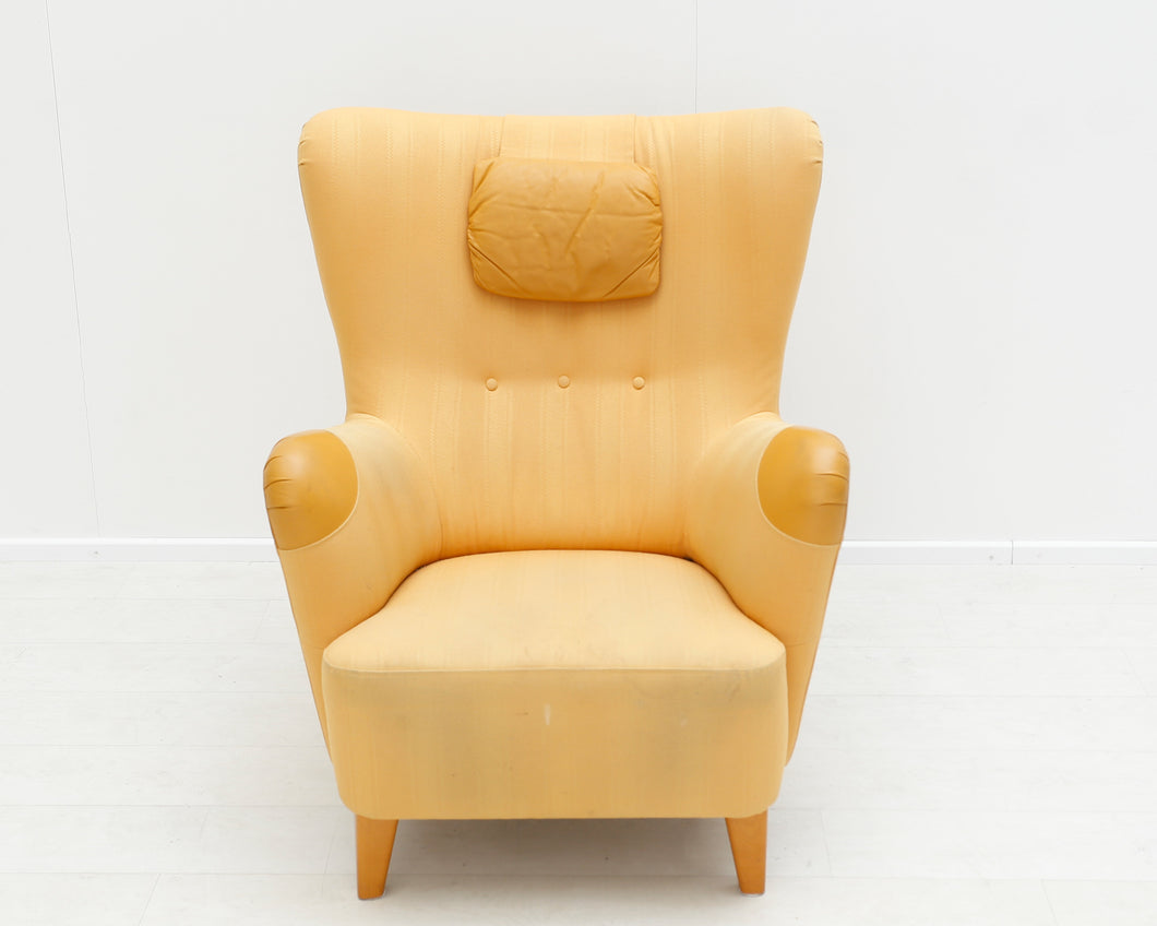 Keltainen nojatuoli + rahi