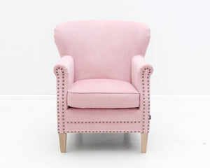 Isku vaaleanpunainen nojatuoli