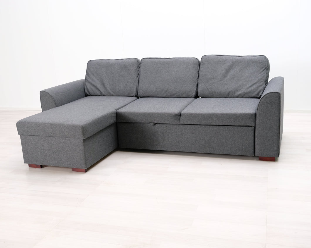 3-istuttava kulmasohva vuoteella harmaa